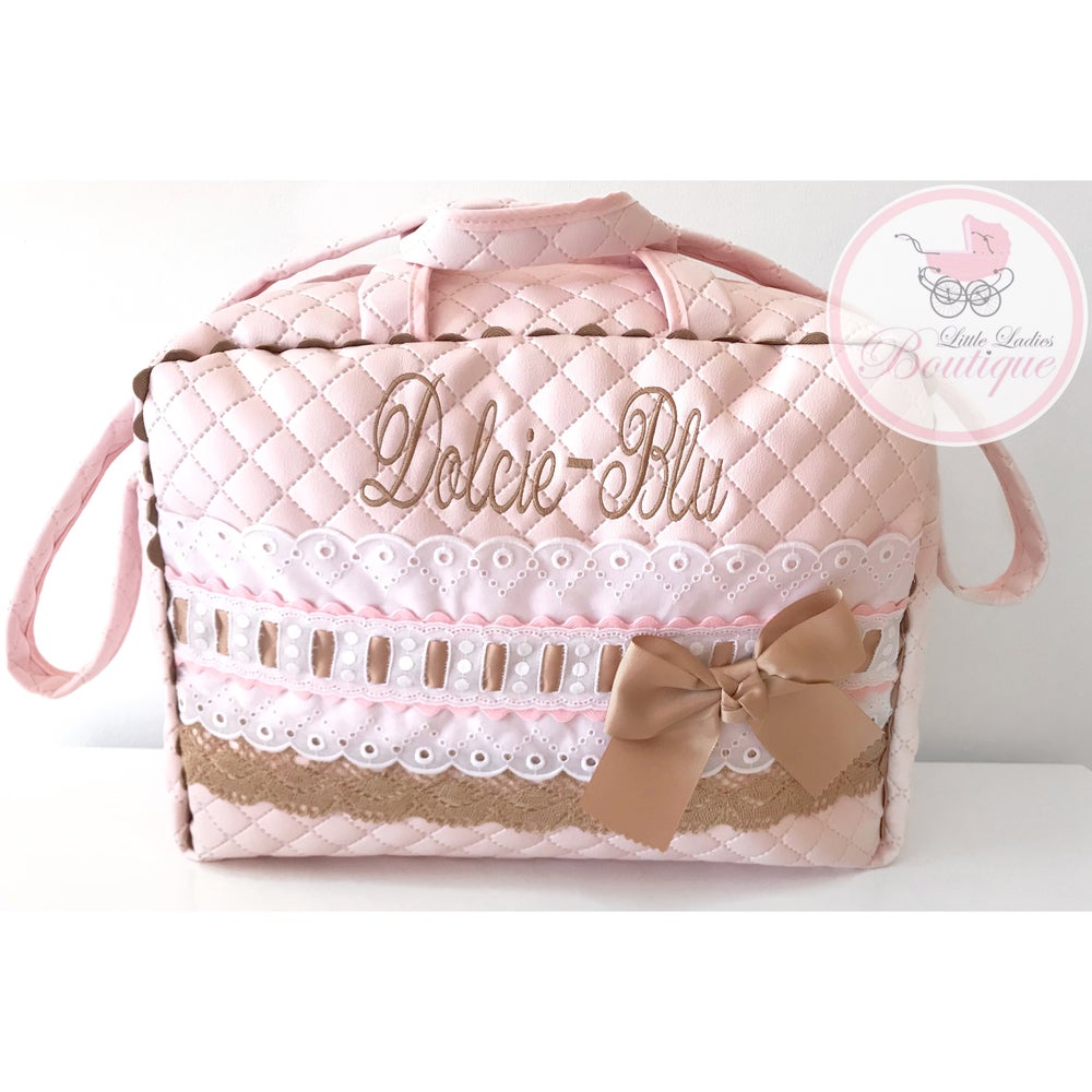Personalized baby bags.