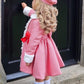 Red houndstooth coat
